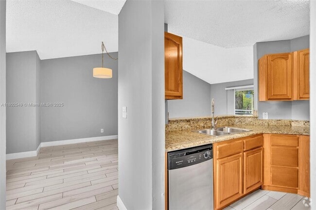 Building Photo - 3473 NW 44th St Unit 201 Rental