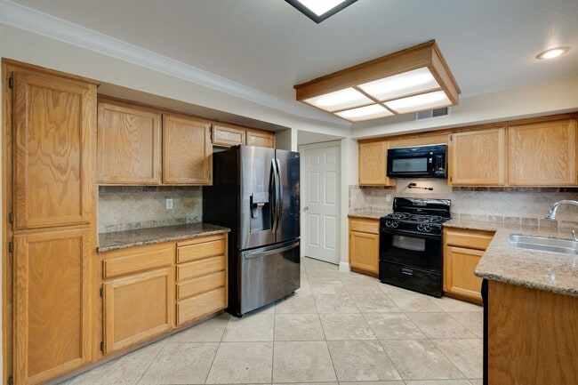 Photo - 3-Bed, 2.5-Bath Antelope Home with Vaulted Ceilings & Spacious Yard