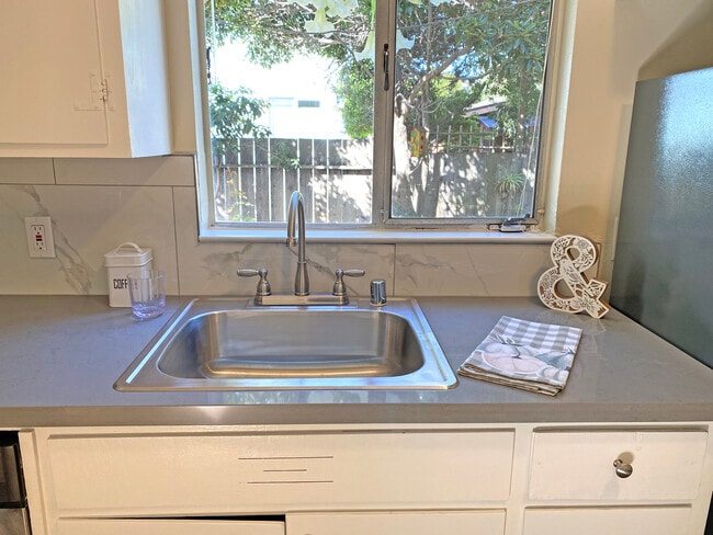 Kitchen view of garden - 1114 Stannage Ave Unit 1114