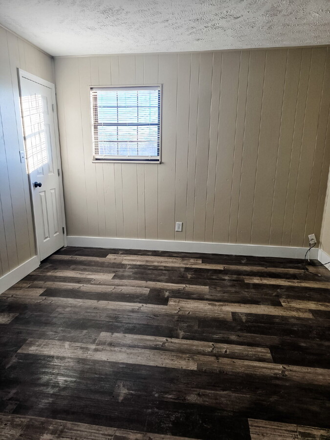 Photo - Renovated 1-bedroom, 1-bath apartment featuring a bright, modern layout with stylish updates thro... Unit 6