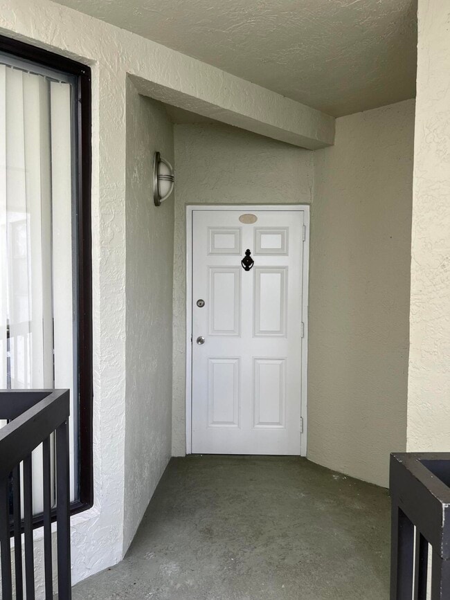Building Photo - 6417 La Costa Dr Unit 204
