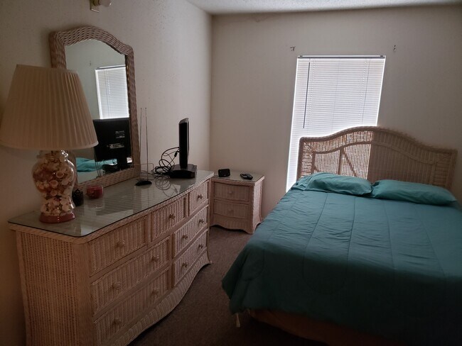 Master Bedroom - 8911 Blind Pass Rd Unidad Furnished