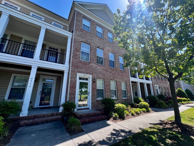 Elegant three story brick townhome with a ... - Elegant three story brick townhome with a ...