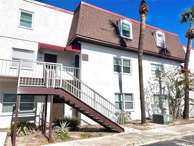 Building Photo - 9105 Tudor Dr Unit F105