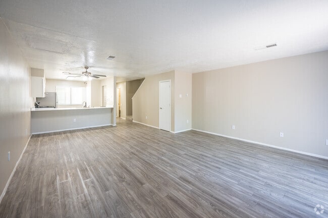 2BR, 2.5BA - 1,282SF - Living Room and Kitchen