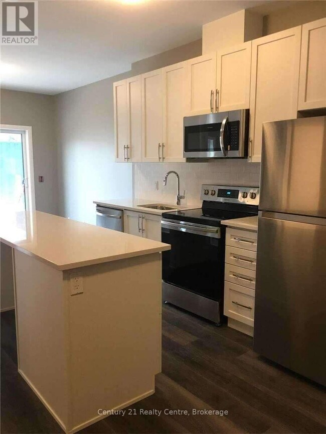 Photo - 102 Grovewood Common Unité 134