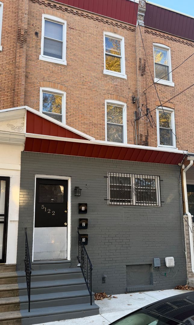 Building Photo - 5122 Arch St Unit 2