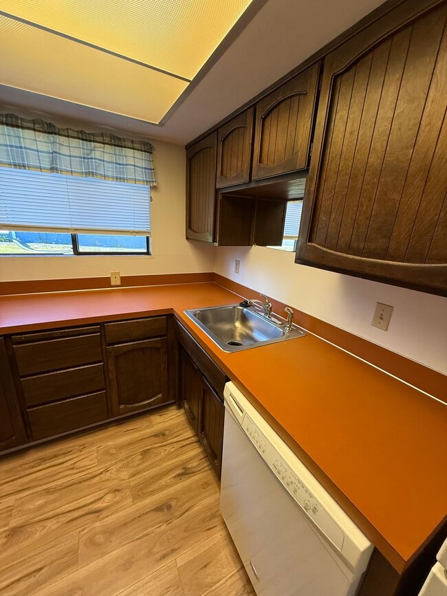 Photo - Spacious Single-Level Living with Retro Charm, Private Garage & Abundant Storage Unit 4