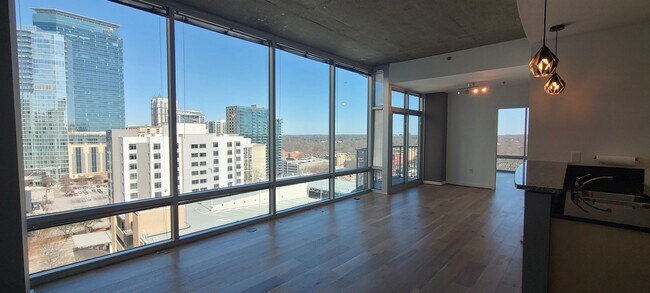 Photo - Modern Corner Unit 1BR Condo in Midtown with Skyline Views