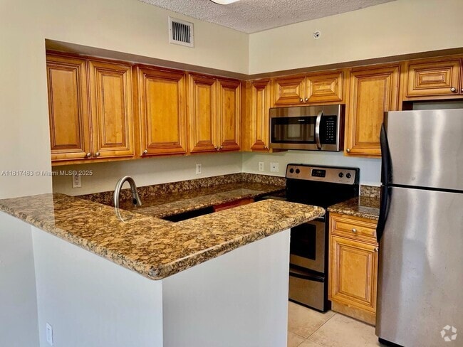 Building Photo - 12178 St.Andrews Pl Unit 104 Rental
