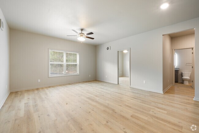 2BR, 2BA - 720SF - Living Room - Platform Flint River