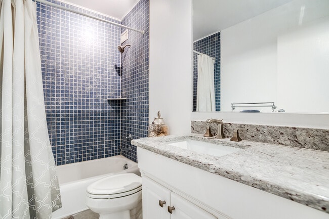 Updated bathroom with granite counters - 2928 Dean Pky Unit 5B