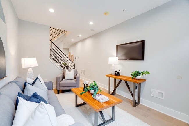 Photo - Spacious 3BR Home with Finished Basement & Roof Deck