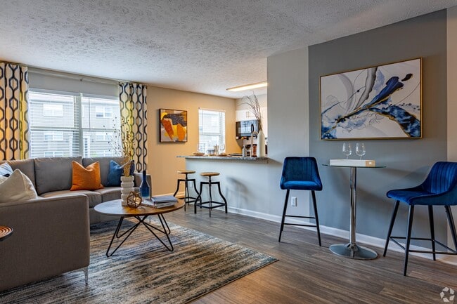 Spacious living room with hardwood-style flooring