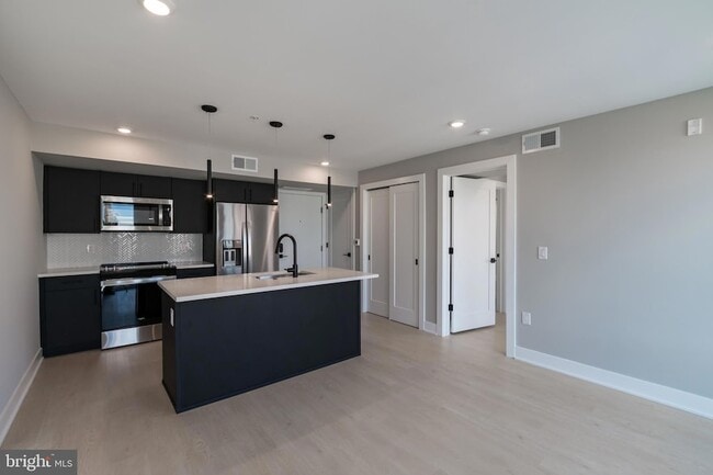 Building Photo - 6604 Ridge Ave Unit 309