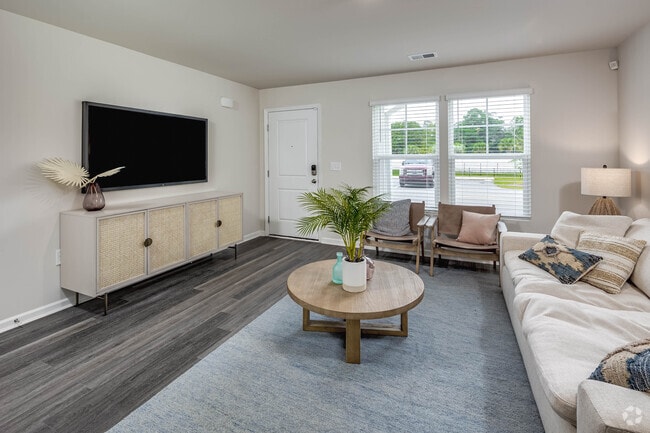 Living room towards front entry from dining room.