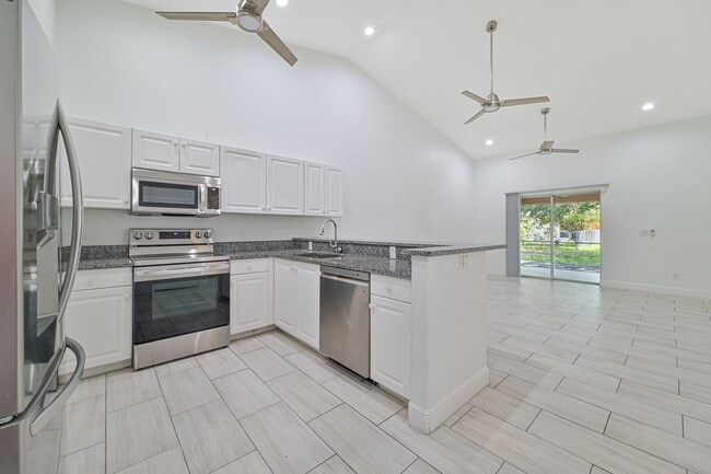 Photo - ** Rarely Available  ~ 3/2 Duplex W/ 2 Car Garage ~ Updated **