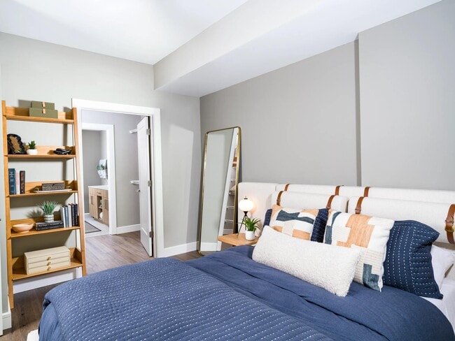A serene primary bedroom, offering layered comfort and thoughtful design, with the rhythm of Nashville just beyond your door.
