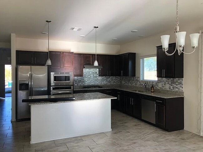 Building Photo - 9810 N Howling Wolf Rd Rental