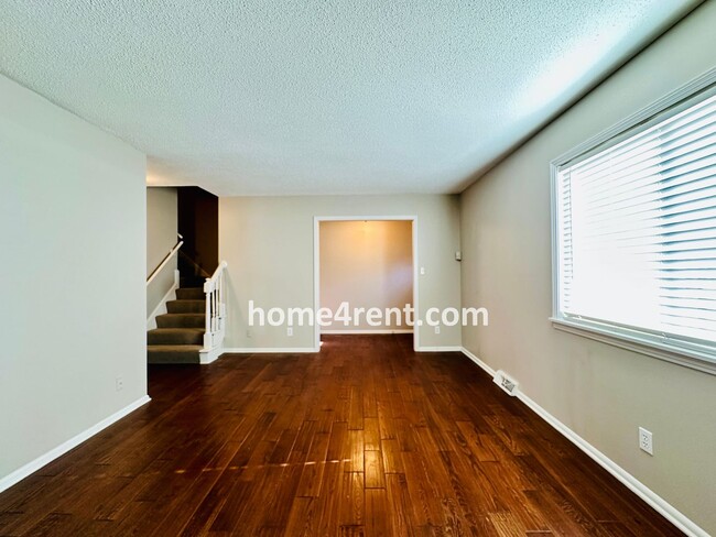 Photo - Beautiful Overland Park Townhome w/ Wood Floors, Large Open Kitchen and a Community Pool!