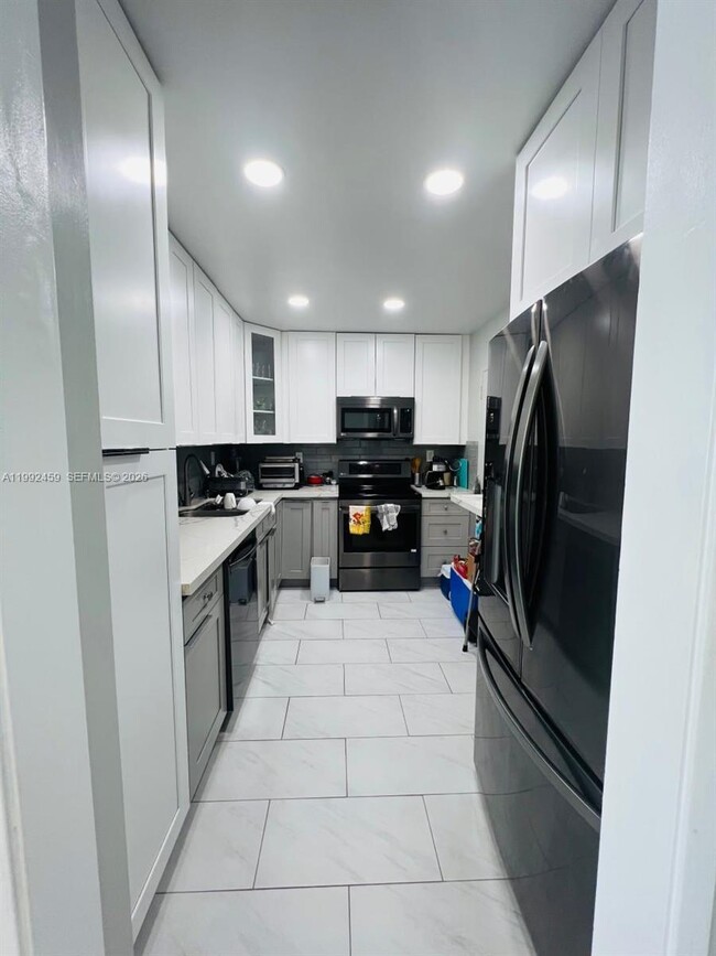 Photo - 400 Kings Point Dr Unidad 1504