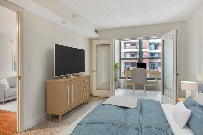 Bedroom and sunroom (virtually staged) at West End Residences, Washington