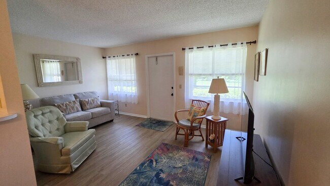 Photo - ANNUAL RENTAL 1/1 COMING SOON 55+ Unit 104