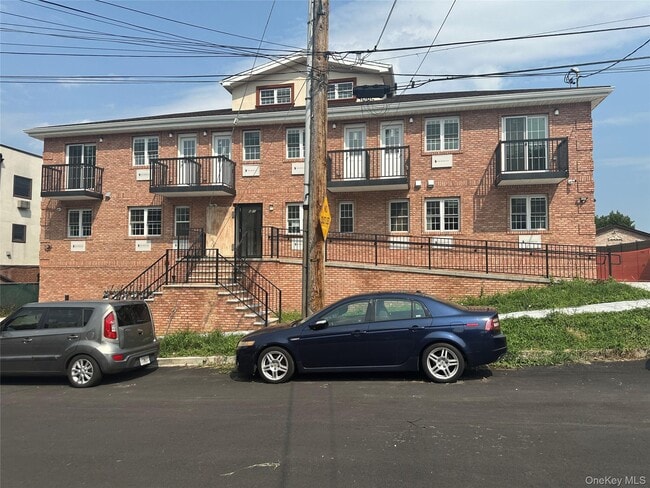 Building Photo - 6-5 129th St Unit 1D