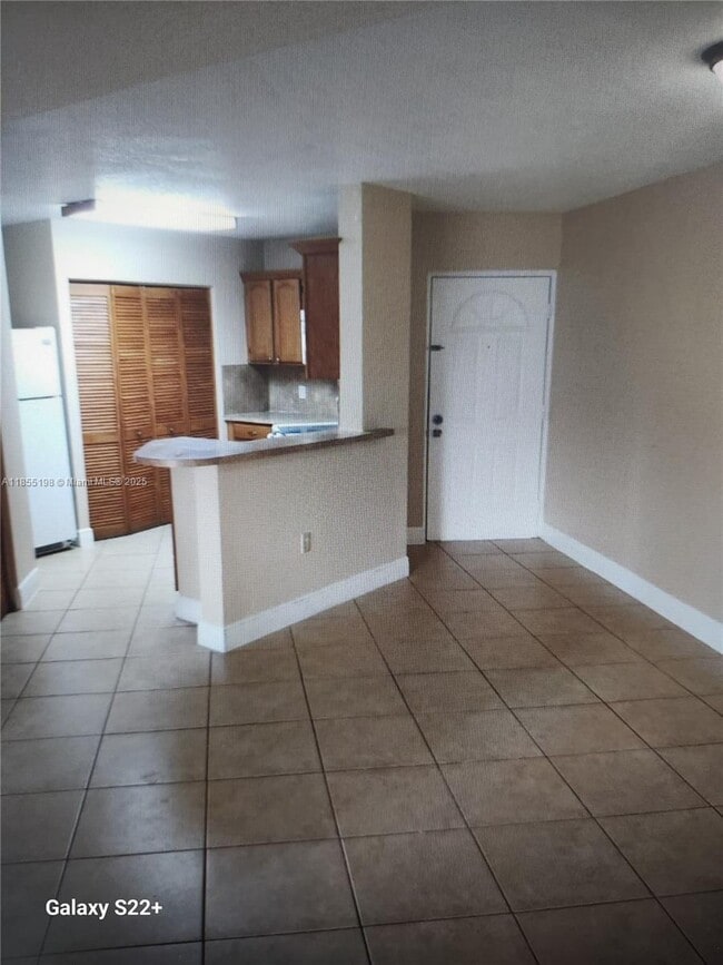 Building Photo - 6284 NW 186th St Unit 103 Rental