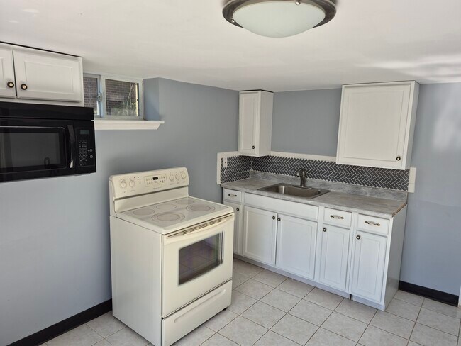 Kitchen/new cabinets and counter top - 136 S 3rd St Unit B