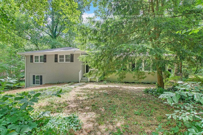 Building Photo - 5747 Woodland Dr