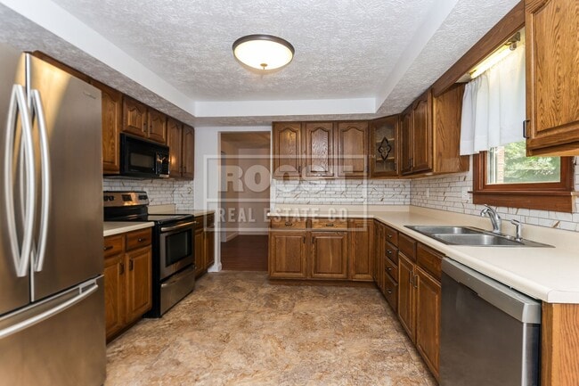 Photo - 4 Bed 2 and a Half Bath Single Family Home!
