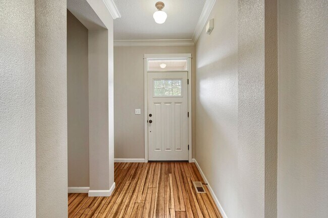 Photo - Custom-Built 4BR/2.5BA Two-Story Near Woodstock — Quartz Island Kitchen, Gas Fireplace & Fenced Y...