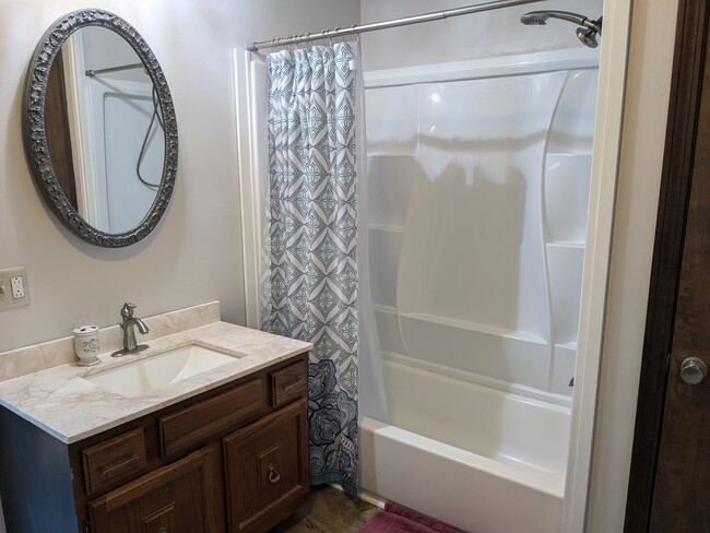 full size tub and shower with duel shower heads - 15 Amber Ct Apartments