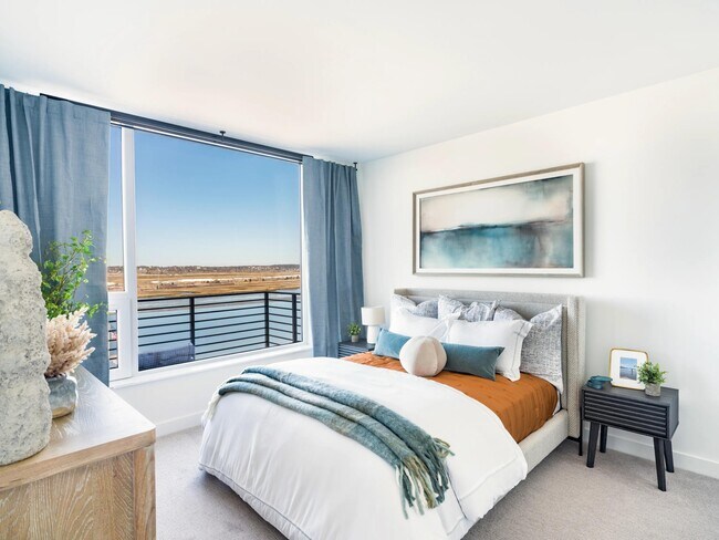 Bedrooms with water views, soft natural light, and comfortable space to unwind.