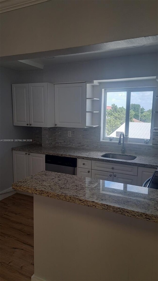 Building Photo - 2415 Lincoln St Unit 307