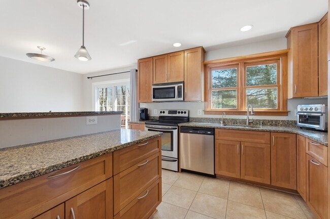 Photo - 5BR / 3BA Home with Flexible Living Space & Tree-Lined Views