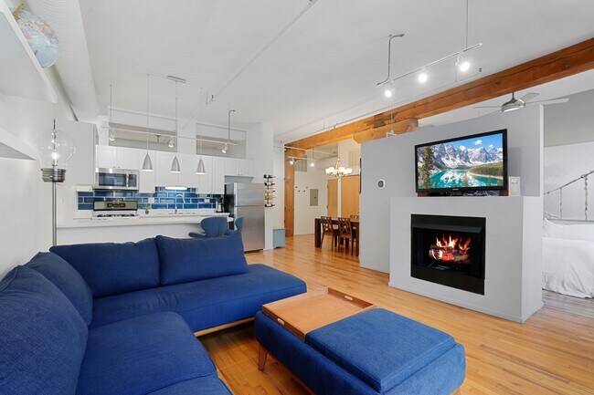 open concept, bright yet warm true timber loft - 417 S Jefferson St Unit 409