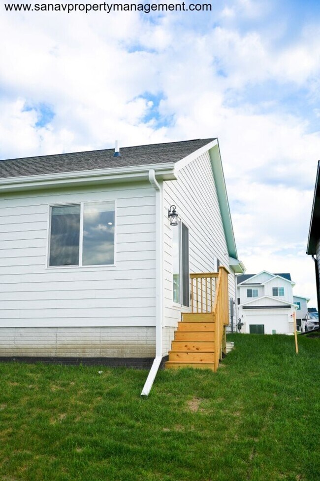Photo - "Modern Comfort Meets Convenience: Your Ideal Home in Waukee"