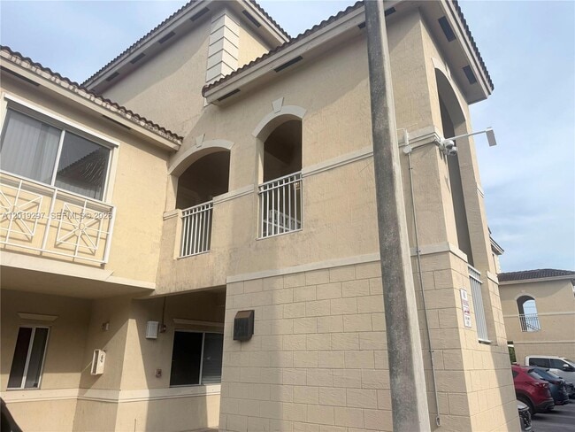Building Photo - 7989 NW 8th St Unit 107D