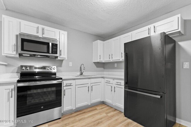 Building Photo - 7230 Melvin Rd