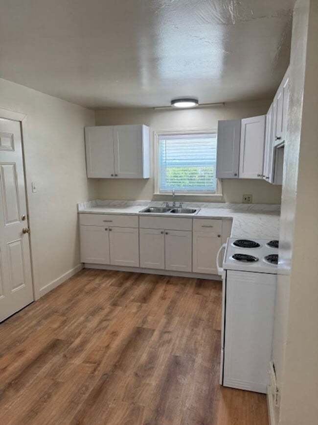 Photo - Downtown Home with One Car Garage and Fenced Backyard