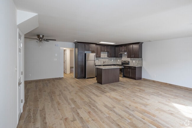 2BR, 1BA - 1150SF - Living Room/Kitchen - 55+ Montauk Villas Senior