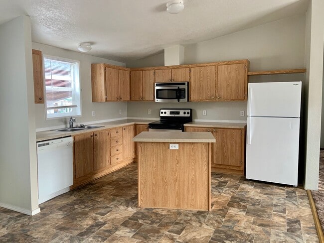 Building Photo - 3 bedroom, 2 full baths, carport and shed