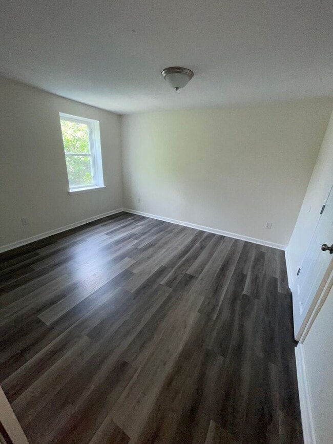 Photo - 3-Bedroom Home with Modern Finishes & Spacious Backyard