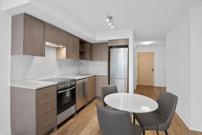 Building Photo - One Plus Den Furnished Unit 1