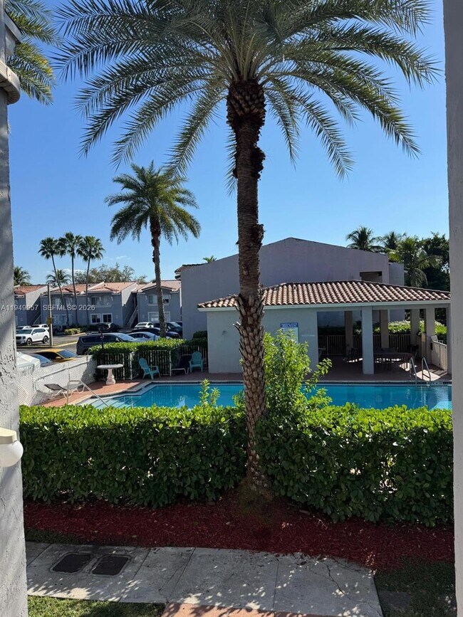 Building Photo - 4744 NW 114th Ave Unit 202