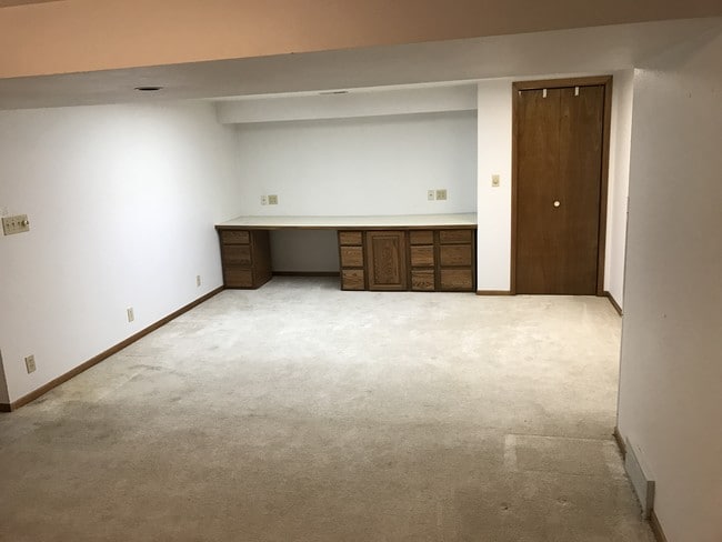 Large living room w/ built-in desk/storage - 3117 Northwood Dr Unit 1