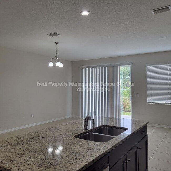 Photo - 6409 Tillandsia Pl