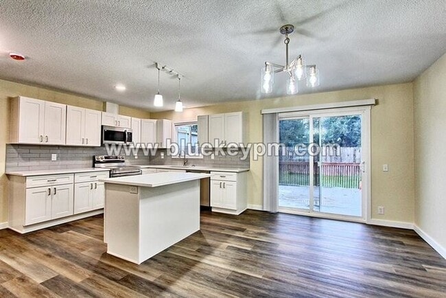 Photo - 5 Bed, 3 Bath Home in Orchards with Primary Bedroom on Main